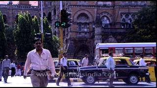 Man crossing a busy road of Mumbai in front of Brihanmumbai Municipal Corporation [upl. by Derina632]