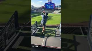 a guy hitting a golf ball at coors Field denver colorado [upl. by Anitnatsnok]