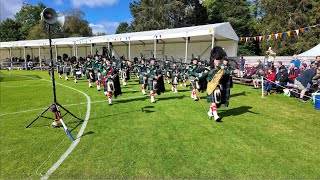 Huntly Pipe Band playing Hills Argyll on the march at 2024 Lonach Gathering amp Games in Scotland [upl. by Doralia]