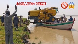 Harvesting Machine Loading On Boat in Sindh River  Newholand 8070 Harvester Machine [upl. by Gnanmas751]