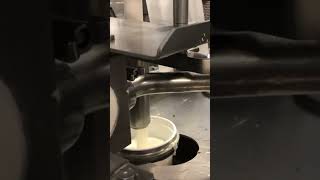 Sour cream cup filling machine from Osgood Industries built in the USA and to 3A compliance [upl. by Llohcin]