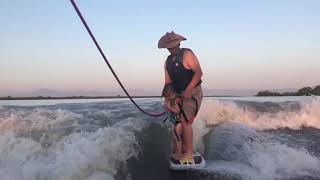 4yearold girl tries wake surfing with dad for the first time Kowabunga dude [upl. by Emiolhs]