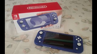 Nintendo Switch Lite Blue  Unboxing amp Setup [upl. by Johannessen711]