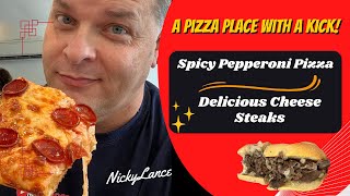 A Pizza Place With A Kick Spicy Pepperoni Pizza And Delicious Cheese Steaks [upl. by Barbee]