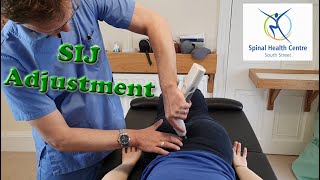 Chiropractic Activator SIJ Adjustment [upl. by Ruhtua988]