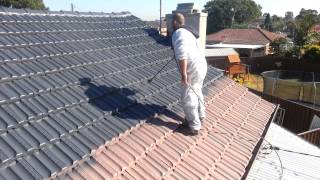 Painting Terracotta Roof Tiles Step 4 applying Dulux Paint  Able Roof Restoration [upl. by Sacksen]