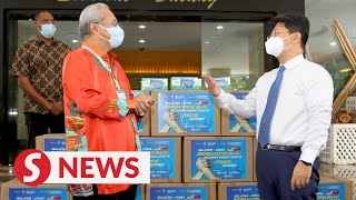 Covid19 Malaysia receives 100000 face masks from China to aid frontliners [upl. by Marcell]