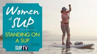 How to Stand on a Stand Up Paddleboard  SUP 101 Techniques [upl. by Carisa]