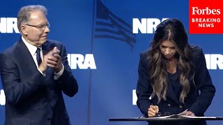 BREAKING NEWS Kristi Noem Signs Executive Order To Protect Gun Rights At NRA Convention [upl. by Alyworth]