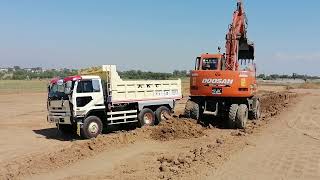 Doosan Excavator 140wv Boundry wall working amp loading the Nissan dumper trucks excavatorloading 💯🤗✅ [upl. by Elliven]