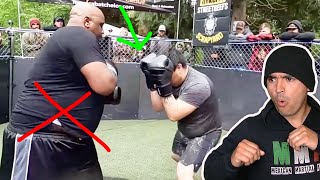 Overhand right vs Oversized man  Boxing BREAKDOWN [upl. by Adleremse208]