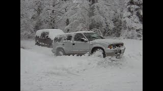 1997 GMC Jimmy blasting through snowplow windrow Addington Highlands Ontario Canada Feb 2013 [upl. by Darcy]