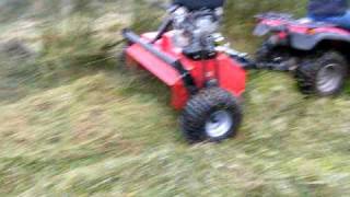 QUADX flail mower in action in WET RUSHES [upl. by Sedgewick]