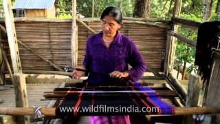 A Lotha Naga woman weaving on loin loom [upl. by Berliner]