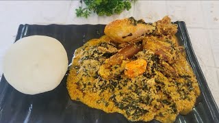 EGUSI VEGETABLE SOUP AND POUNDED YAM [upl. by Asseret]