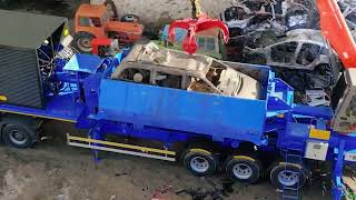 Heavy machinery working at an auto recycling landfill [upl. by Akilak]