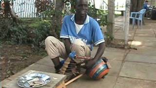 Luo Traditional Music Man singing and playing Nyatiti [upl. by Kassab188]