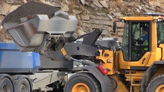 Volvo L90H  Loading Scania and Volvo trucks in quarry [upl. by Nitsir]