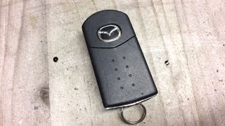 How to change a dead battery on a Mazda key fob [upl. by Welles]