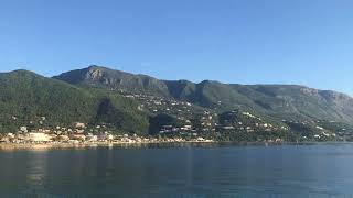 Corfu a sweeping view of ipsos beach from boat [upl. by Eldora]