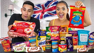 Trying BRITISH SNACKS for the FIRST TIME WOAH [upl. by Colwin211]