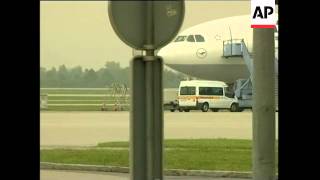 Plane carrying suspected Nazi guard arrives in Germany convoy [upl. by Grimbald421]