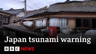 Japan downgrades major tsunami warning after earthquakes  BBC News [upl. by Yelime827]