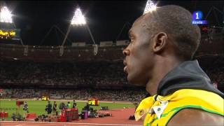 Usain Bolt stopped the interview to hear the US anthem [upl. by Iniffit]