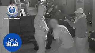 Dramatic moment two thugs armed with paintball guns storm a brothel [upl. by Hgielrak]