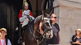 KINGS GUARD TAKES ACTION AS MAN GRABS THE HORSES NECK [upl. by Barnet]