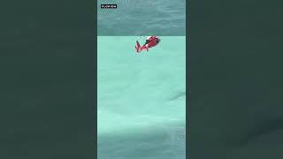 Man floating on cooler saved in water rescue [upl. by Anialahs559]