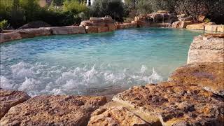 Piscine naturelle avec cascade  plage immergée et jets massage [upl. by Meuser]