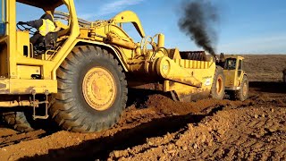 CAT 637E and 651B Scrapers push pulling  D8T Dozer using rippers [upl. by Whang]