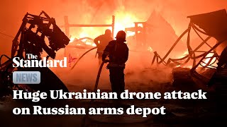 Huge Ukrainian drone attack leaves arms depot inside Russia ablaze [upl. by Eibbed14]