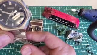 How to polish scratches out of a Stainless Steel watch using a dremel [upl. by Follmer13]