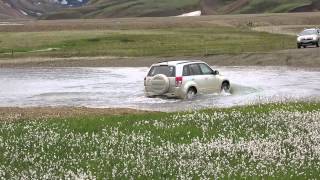 Small cars fording river near Landmannalaugar Iceland 2014 07 17 [upl. by Beshore]