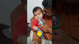 Giving nebulizer to 7 months old baby nebulization nebulizer nebmod [upl. by Attenyw]