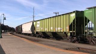 BNSF 5108 And UPs 7695 7823 Lead A Grain Train  Vancouver WA w Canon HF11 [upl. by Annauqahs]