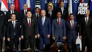 Biden appears confused while standing with world leaders after struggling to pronounce names [upl. by Gerrard]