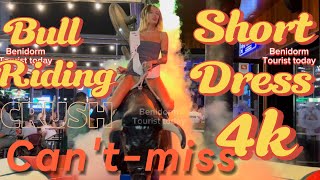 Girl 🧒 Bull 🐂 riding in short dress  Mechanical bull 🐂 riding Benidorm bull  Bull riding [upl. by Hajile]