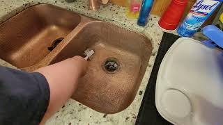 Using Bar Keepers Friend product in a copper kitchen sink [upl. by Gilmore]