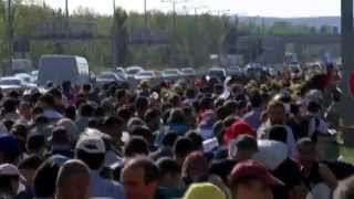 Thousands of refugees and migrants in mass walk out of Hungary [upl. by Irolav161]