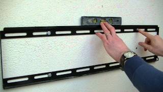 How to Mount a Large LCD LED or Plasma TV on a Wall using a Fixed TV Bracket [upl. by Cyndy]