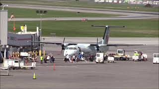 Passenger Disembarking From A Turboprop Passenger Plane In Montreal Airport [upl. by Gean908]