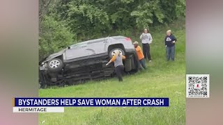 Bystanders help save woman after crash [upl. by Shiau]