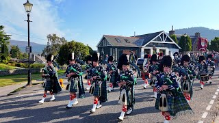 Pipe Band lead the Braemar Royal Highland Society on the march to 2024 Braemar Gathering in Scotland [upl. by Nahpos]