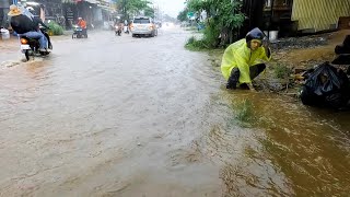 Draining Flooded Streets Clearing Blocked Storm Drains [upl. by Axe55]