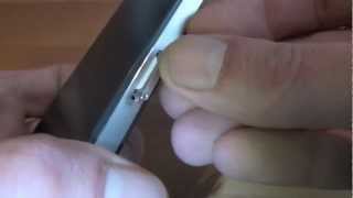 How to insert a SIM Card into Apple iphone 4 [upl. by Peyter447]