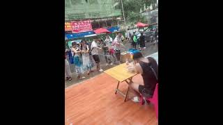 Wet surprise water gun prank backfires at Yunnans water splashing festival [upl. by Eric]