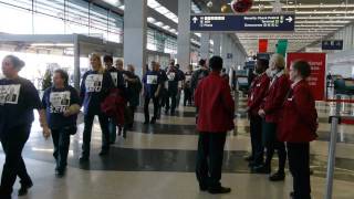 OHare janitors call on Mayor Emanuel to protect middle class jobs in Chicago [upl. by Cook]